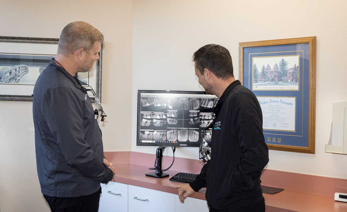 Dr. Hardy and Dr Kahl Evaluate a Mouth Before Implants and Cosmetic Dentistry